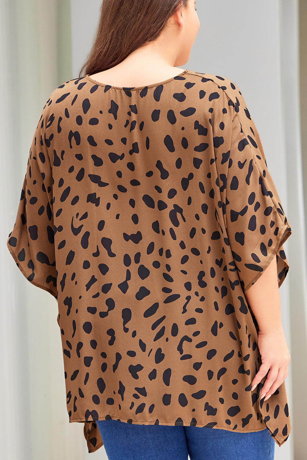 Animal Print Handkerchief Hem Blouse